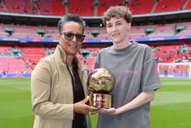 Madison Hadley of Preston North End is presented with Mitre Golden Ball trophy by Hope Powell prior to The Adobe Women's FA Cup Final match between Chelsea and Manchester United